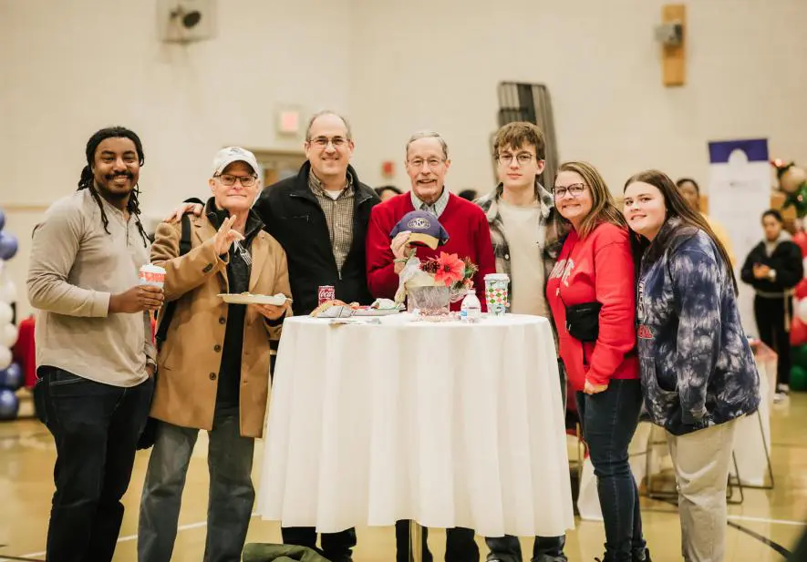 A group of Kiwanis Club of Akron members at the Mason Christmas wrap.